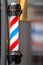 Barber shop vintage pole on blurred background