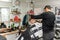 barber works with a male client in the salon, close-up