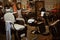 Barbershop interior. Chairs and mirrors. Light and shadows.