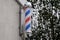 Barbershop sign with Barber Pole in street