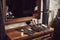 Barbershop tools on wooden brown table. Accessories for shaving and haircuts on the table.