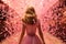 Barbie walks the red carpet amid pink glitter confetti at the movie premiere