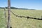 Barbwired fence on Wyoming prairies