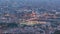 Barcelona and Badalona skyline with roofs of houses and sea on the horizon day to night