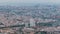 Barcelona and Badalona skyline with roofs of houses and sea on the horizon at evening