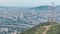 Barcelona and Badalona skyline with roofs of houses and sea on the horizon at evening timelapse