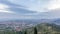 Barcelona and Badalona skyline with roofs of houses and sea on the horizon at evening timelapse