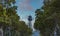 Barcelona Cable Car Through Trees at Dawn