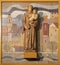 Barcelona - The carved modern statue of St. Anthony with the terracotta background in the chruch Iglesia de Belen