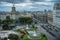 Barcelona cityscape with skyscrapers and park - Taxis and trams on the road