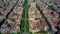 Barcelona dwelling houses blocks pattern and major street aerial view, Spain
