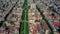 Barcelona dwelling houses blocks pattern and major street aerial view, Spain. 4K video