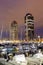 Barcelona Marina yacht harbor Port Olimpic city town at twilight portrait format in Spain