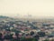 Barcelona panorama with the silhouette of the Sagrada Familia on the horizon on a cloudy foggy day. Beautiful urban landscape of