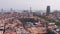 Barcelona rooftops and distant seaport, Spain