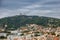 Barcelona`s hill tops with buildings of apartments and church