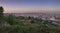 Barcelona skyline during sunset from city park Jardins del Mirador