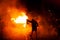 Barcelona, Spain - 16 october 2019: spectacular scary image of young catalan pro independence activist march against fire during