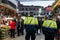 Barcelona, Spain - 19 december 2018: catalan and spanish armed police force patrol christmas market as a prevention for terrorists