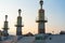 Barcelona, Spain - 19 january 2022: Panorama of Parc de l`Espanya Industrial at sunset with warm natural light and lake.