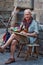 Barcelona, Spain - 26th October 2019: Man painting in the streets of Barcelona, Gothic Quarter