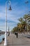 Barcelona, Spain-April 12, 2023. A tranquil scene of a sailboats gliding in the harbor with reflections on the still water,