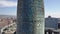 BARCELONA, SPAIN - APRIL, 15, 2017. Torre Agbar tower close-up rising aerial shot. 4K video