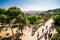 BARCELONA, SPAIN - April, 2019: Park Guell entrance buildings. The Park Guell is a public park system composed of gardens and