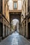 Barcelona, Spain-April 24, 2023. An alleyway in the Gothic Quarter of Barcelona, Spain, the Pasaje de la Paz, with its Gothic