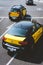 BARCELONA, SPAIN. April 26, 2018: Taxi at the road junction of the city of Barcelona in Spain. Classic taxi yellow and