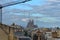 BARCELONA, SPAIN - APRIL 28: View of the Sagrada Familia from the roof terrace of Gaudi Casa Mila or La Pedrera on April 28, 2016