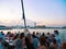 Barcelona, Spain - august 2019: a lot of tourists on excursion boat sailing Mediterranean sea, medium view. Modern