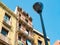 Barcelona, Spain - august 2019: vintage building in city center, long view. Balconies with vintage railings. Black