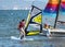 Barcelona, Spain, July 22, 2019: Windsurf Initiation. Man learning to turn the sail