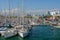 Barcelona, Spain - June 6: Sail boats on June 6, 2016 in Barcelona, Spain. Calm sea and sail boats by the pier inside the harbor