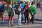 BARCELONA, SPAIN - MAY 16, 2017: Unknown young women stand on the crosswalk in Port Vell in center of Barcelona