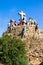 BARCELONA, SPAIN - OCT 19,2014: Tourists on Hill of Three Crosses ormonumentto Calvary in Park Guell