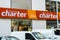Barcelona, Spain - October 16, 2021. Logo and facade of Charter, a Consum franchise, a Spanish cooperative in the distribution