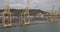 Barcelona, Spain - October 20, 2019: Aerial view. Seaport and loading docks at the port with cranes and multi-colored