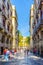 BARCELONA, SPAIN, OCTOBER 24,2014: View of a narrow street leading to the Placa Reial in Barcelona, Spain....IMAGE