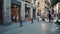 Barcelona, Spain - September 2018: Historical center of the city Gothic Quarter. Motorcyclists and passersby are moving