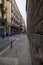 Barcelona, Spain - September 23, 2021: View into the narrow streets of the city. Beside the big boulevards narrow alleys