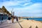 Barceloneta beach and promenade. Barceloneta beach is oldest and most famous in city of Barcelona