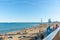 Barcelonetta Beach with architecturally modern W Hotel in distance, sunbathers along sandy beach Barcelona Spain