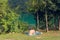 Barcis, Pordenone, Italy - August 12, 2018: people relax on the picturesque lakeside