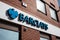 Barclays bank sign, signage, logo and branding on a wall