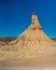 Bardenas desert iconic pyramid formation against blue sky