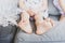 Bare feet of anonymous little girl resting on couch