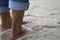 Bare feet on the beach