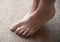 Bare feet on a carpet